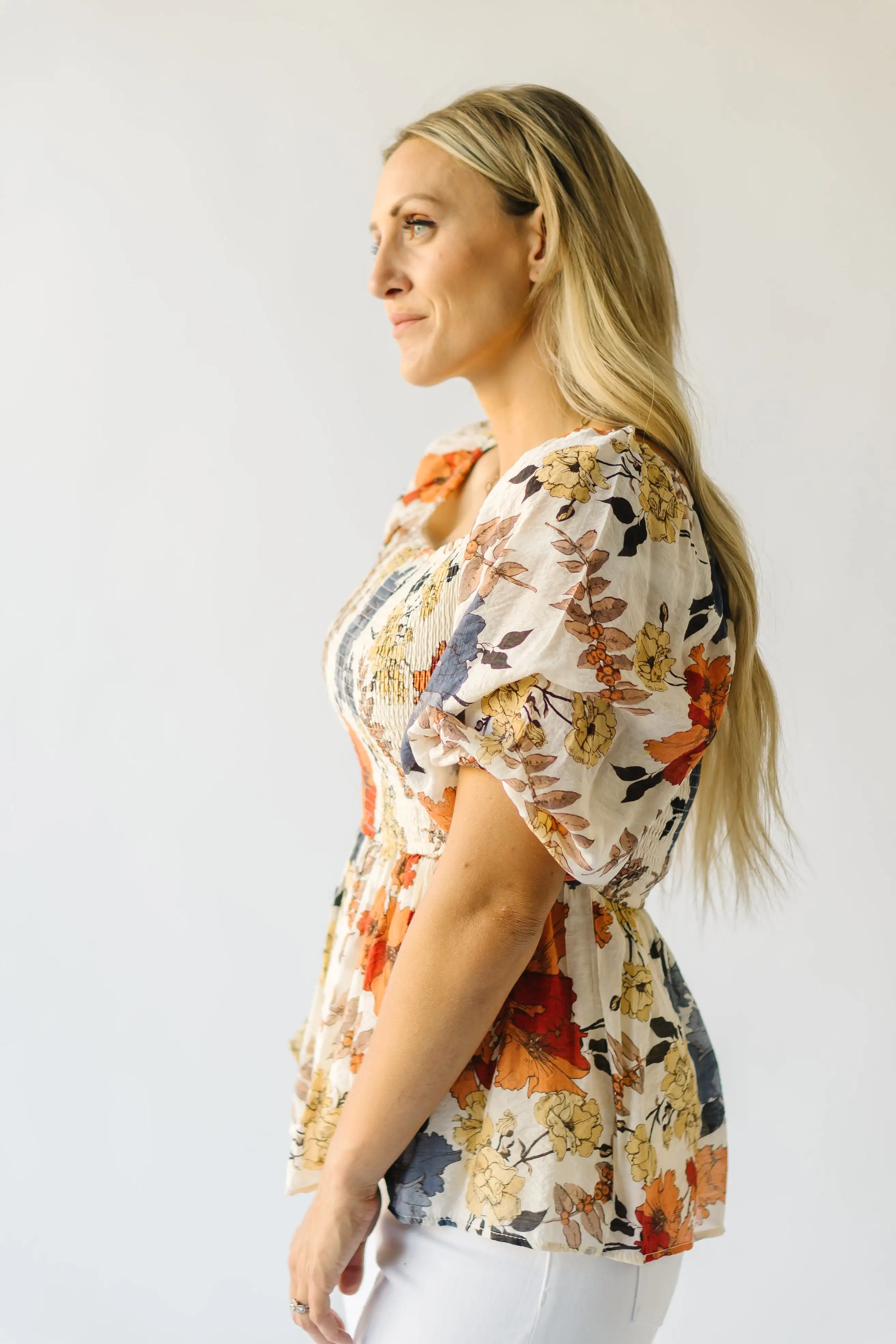 The Ashbelle Smocked Peplum in Rust Multi