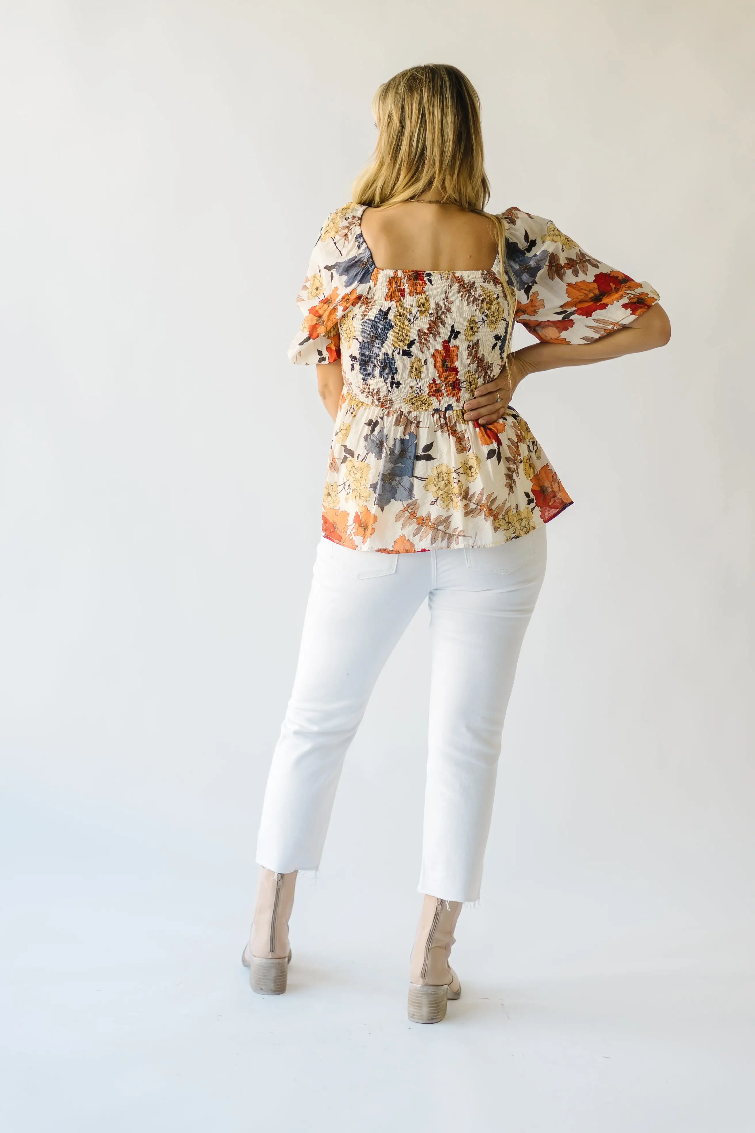 The Ashbelle Smocked Peplum in Rust Multi