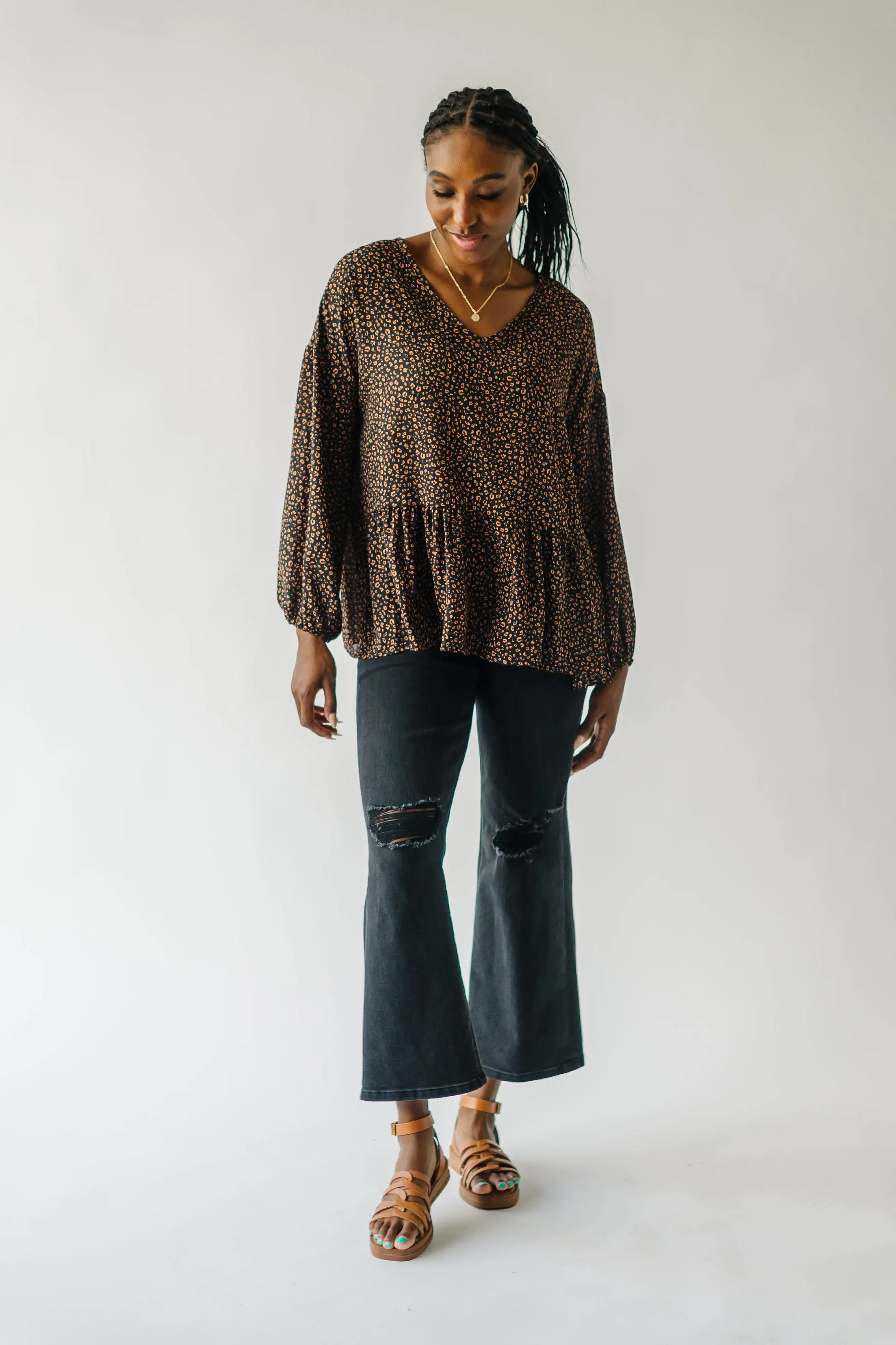 The Solana V-Neck Cheetah Peplum in Black + Terracotta